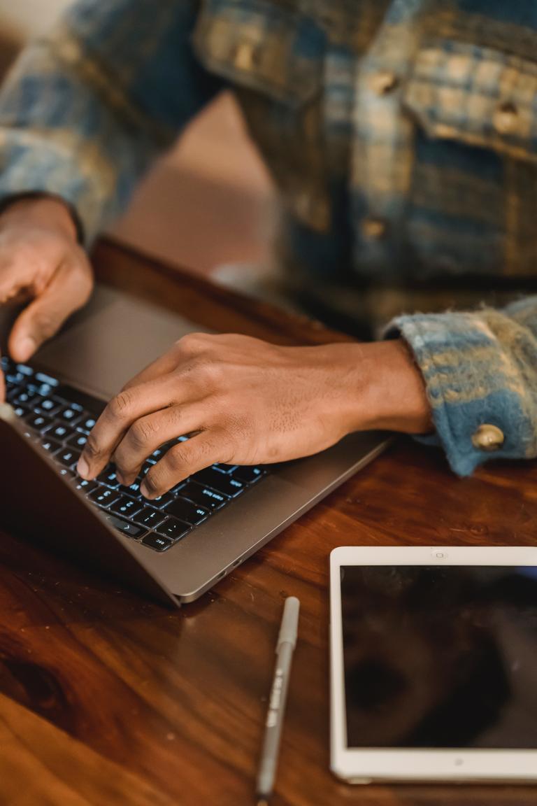 Woman behind laptop